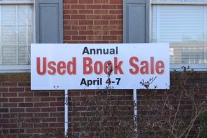 Used Book Sale sign in front of library