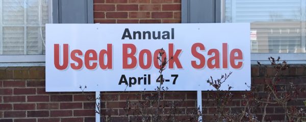 Used Book Sale sign in front of library